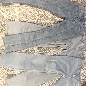 3 pairs of jeans 1 pair of bell bottoms and two pairs of baggy pants.